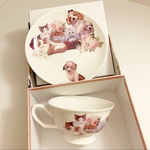 Porcelain cup and saucer set cats & dogs print